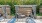 a pool deck with cabanas
