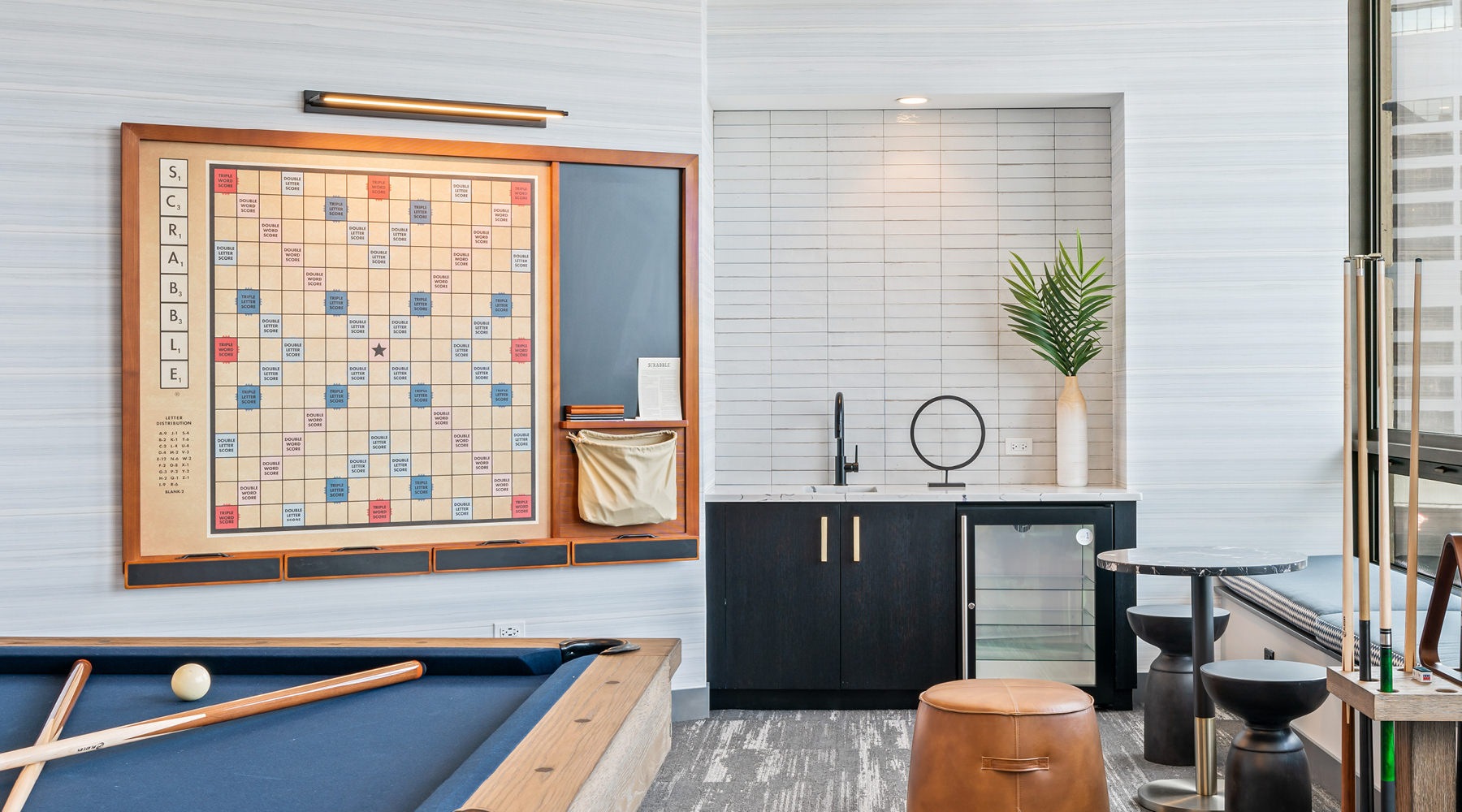 a spacious clubroom with billiards