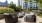 a group of chairs and benches in a courtyard