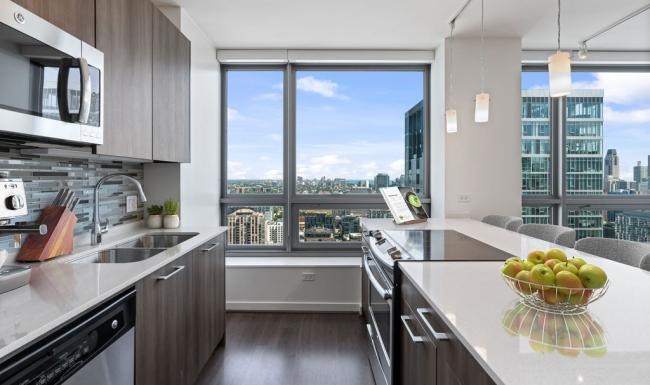a kitchen with a large window